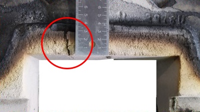 Fig. 6: A crack appeared in the mold during casting (marked in red). Did it affect quality? 